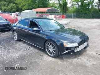 2015 Audi A8 3.0T z VIN WAU3GAFD6FN008993, wystawiony jako IAAI lot #42239421 z przebiegiem 125 587 mil mil oraz . Historia ofert i sprzedaży dostępna na DreamBid. Obrazek 1.