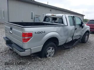 2014 Ford F-150 XL with VIN 1FTEX1EM2EFB00107, listed as a IAAI auction lot 40443721 with 121,674 mi miles and . Bid and sale history available at carsss.com. Image 4.