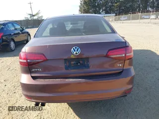 2017 Volkswagen Jetta S z VIN 3VW2B7AJ6HM324093, wystawiony jako IAAI lot #41681726 z przebiegiem 84 248 mil mil oraz . Historia ofert i sprzedaży dostępna na DreamBid. Obrazek 16.