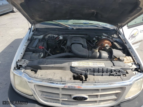 2001 Ford F-150 SuperCrew XLT with VIN 1FTRW07W41KE02772, listed as a Copart auction lot 73586724 with 0 mi miles and Salvage Title. Bid and sale history available at carsss.com. Image 11.
