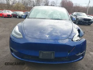 2023 Tesla Model Y Long Range z VIN 7SAYGDEE2PF694974, wystawiony jako IAAI lot #41814582 z przebiegiem 31 726 mil mil oraz . Historia ofert i sprzedaży dostępna na DreamBid. Obrazek 12.