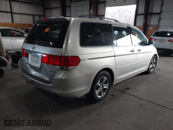 2009 Honda Odyssey Touring с VIN 5FNRL38979B005813, выставлен на аукционе IAAI как лот 41049383 с пробегом 174 897 миль миль и . История ставок и продаж доступна на DreamBid. Изображение 4.
