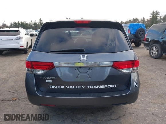 2014 Honda Odyssey EX-L with VIN 5FNRL5H67EB073640, listed as a IAAI auction lot 41115124 with 99,841 mi miles and . Bid and sale history available at carsss.com. Image 16.