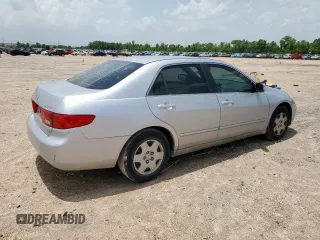 2005 Honda Accord LX with VIN 3HGCM56415G711610, listed as a Copart auction lot 61601425 with 106,728 mi miles and Salvage title. Bid and sale history available at DreamBid. Image 3.