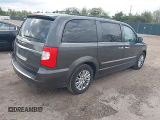 2015 Chrysler Town & Country Touring L with VIN 2C4RC1CG9FR646214, listed as a IAAI auction lot 42202486 with 184,555 mi miles and . Bid and sale history available at carsss.com. Image 4.