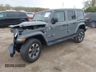 2022 Jeep Wrangler Unlimited Sahara with VIN 1C4HJXEG7NW138105, listed as a IAAI auction lot 42146898 with Not provided miles and . Bid and sale history available at DreamBid. Image 18.