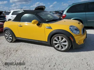 2015 MINI Roadster S z VIN WMWSY3C53FT595389, wystawiony jako Copart lot #77476814 z przebiegiem Nie podano mil oraz Szkody całkowita. Historia ofert i sprzedaży dostępna na DreamBid. Obrazek 4.