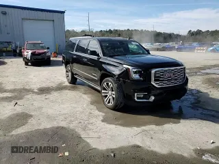2019 GMC Yukon XL Denali with VIN 1GKS2HKJ9KR264134, listed as a Copart auction lot 43138545 with 105,690 mi miles and Salvage Title. Bid and sale history available at DreamBid. Image 14.