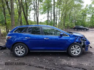 2007 Mazda CX-7 Touring z VIN JM3ER29L070124727, wystawiony jako IAAI lot #42187203 z przebiegiem 140 976 mil mil oraz . Historia ofert i sprzedaży dostępna na DreamBid. Obrazek 13.