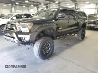 2014 Toyota Tacoma with VIN 3TMLU4EN1EM140074, listed as a Copart auction lot 55887925 with 106,062 mi miles and Salvage title. Bid and sale history available at DreamBid. Image 1.