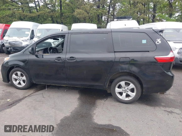 2018 Toyota Sienna L with VIN 5TDZZ3DC7JS912142, listed as a IAAI auction lot 42330428 with 221,498 mi miles and . Bid and sale history available at DreamBid. Image 14.