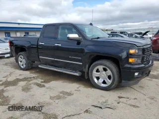 2015 Chevrolet Silverado 1500 LT with VIN 1GCVKREC4FZ258727, listed as a Copart auction lot 55581435 with 160,282 mi miles and Clean Title. Bid and sale history available at DreamBid. Image 4.