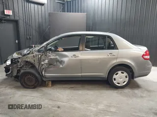 2009 Nissan Versa 1.8 S with VIN 3N1BC11EX9L396439, listed as a IAAI auction lot 42049665 with 49,617 mi miles. Bid and sale history available at carsss.com. Image 14.