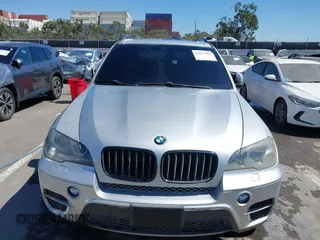 2012 BMW X5 35d z VIN 5UXZW0C5XCL665504, wystawiony jako IAAI lot #41835285 z przebiegiem 134 245 mil mil oraz . Historia ofert i sprzedaży dostępna na DreamBid. Obrazek 12.