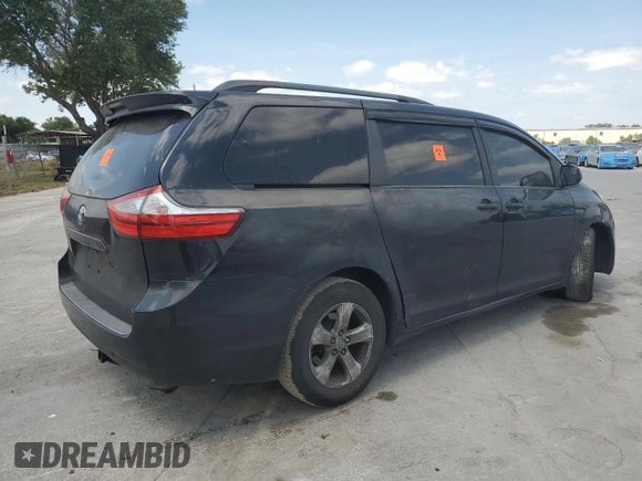 2015 Toyota Sienna LE AAS with VIN 5TDKK3DC3FS653209, listed as a Copart auction lot 54242095 with 228,634 mi miles and Salvage Title. Bid and sale history available at DreamBid. Image 3.