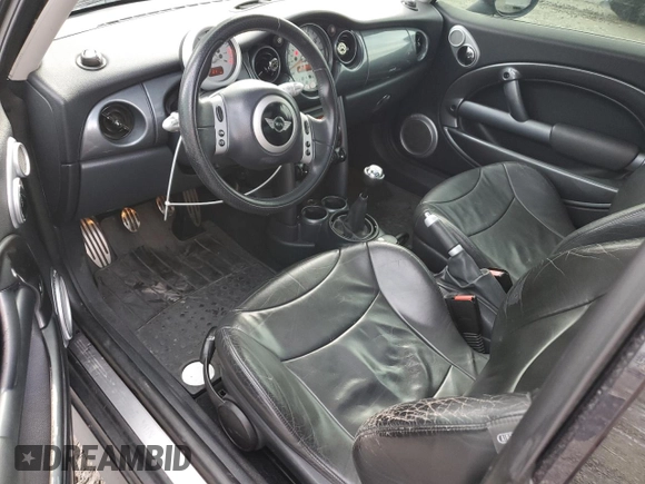 2003 MINI Hardtop S with VIN WMWRE33433TD70970, listed as a Copart auction lot 46120835 with 80,118 mi miles and Salvage Title. Bid and sale history available at DreamBid. Image 8.