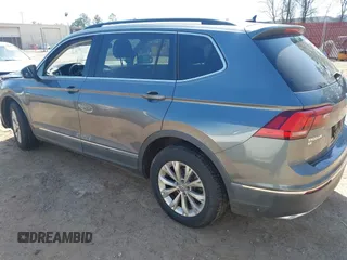 2018 Volkswagen Tiguan SEL with VIN 3VV3B7AX6JM001231, listed as a IAAI auction lot 41781659 with 137,930 mi miles and . Bid and sale history available at DreamBid. Image 3.
