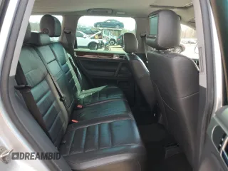 2010 Volkswagen Touareg VR6 with VIN WVGBF7A97AD004355, listed as a Copart auction lot 52861335 with 129,454 mi miles and Salvage Title. Bid and sale history available at DreamBid. Image 10.