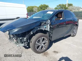 2024 Lexus RX with VIN JTJCHMAA3R2018477, listed as a IAAI auction lot 41738156 with 7,480 mi miles. Bid and sale history available at carsss.com. Image 2.
