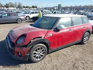 2016 MINI Cooper Clubman with VIN WMWLN5C51G2E30234, listed as a IAAI auction lot 41408299 with 81,895 mi miles. Bid and sale history available at carsss.com. Image 2.
