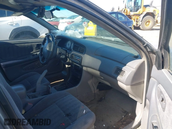 1999 Nissan Altima XE with VIN 1N4DL01D4XC128489, listed as a IAAI auction lot 41530040 with 207,509 mi miles. Bid and sale history available at carsss.com. Image 5.