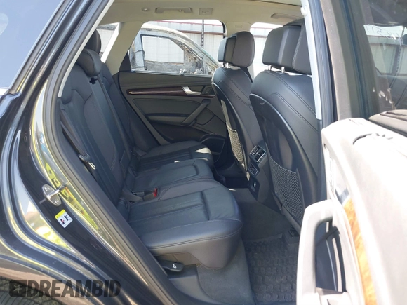 2018 Audi Q5 Premium Plus z VIN WA1BNAFY7J2149356, wystawiony jako IAAI lot #41851706 z przebiegiem 134 874 mil mil oraz . Historia ofert i sprzedaży dostępna na DreamBid. Obrazek 8.