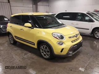 2015 FIAT 500L Urbana Trekking with VIN ZFBCFADH5FZ033844, listed as a IAAI auction lot 41186739 with 86,587 mi miles. Bid and sale history available at carsss.com. Image 1.