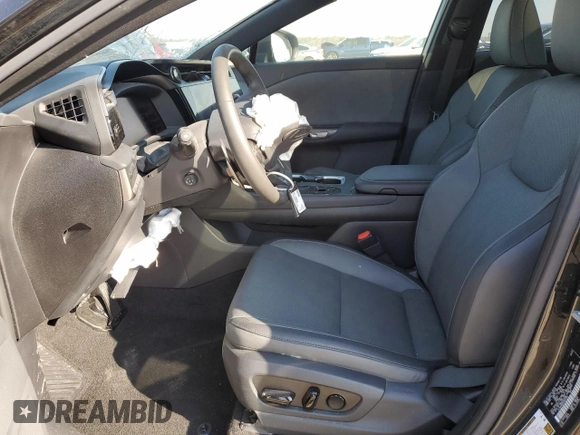 2023 Lexus RZ 450e Premium z VIN JTJAAAAB2PA007458, wystawiony jako Copart lot #47473275 z przebiegiem 6 041 mil mil oraz Szkoda całkowita • Salvage title. Historia ofert i sprzedaży dostępna na DreamBid. Obrazek 7.