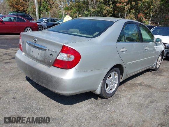 2003 Toyota Camry LE z VIN 4T1BF32K93U053750, wystawiony jako IAAI lot #41930830 z przebiegiem Nie podano mil oraz . Historia ofert i sprzedaży dostępna na DreamBid. Obrazek 4.