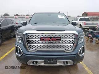 2020 GMC Sierra 1500 Denali z VIN 1GTU9FEL1LZ120581, wystawiony jako IAAI lot #41428827 z przebiegiem 97 917 mil mil oraz . Historia ofert i sprzedaży dostępna na DreamBid. Obrazek 12.