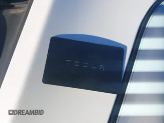 2023 Tesla Model Y Long Range with VIN 7SAYGAEE3PF753657, listed as a IAAI auction lot 41668917 with 33,301 mi miles and . Bid and sale history available at DreamBid. Image 11.