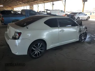 2015 Scion tC z VIN JTKJF5C70FJ003274, wystawiony jako Copart lot #53675415 z przebiegiem 83 326 mil mil oraz Szkoda całkowita • Salvage title. Historia ofert i sprzedaży dostępna na DreamBid. Obrazek 3.