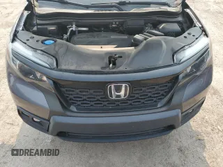 2020 Honda Passport Sport with VIN 5FNYF8H29LB014989, listed as a Copart auction lot 58709715 with 55,230 mi miles and Salvage title. Bid and sale history available at DreamBid. Image 12.