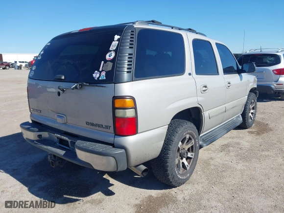 2005 Chevrolet Tahoe LT with VIN 1GNEC13T85J254296, listed as a IAAI auction lot 41676900 with 214,305 mi miles. Bid and sale history available at carsss.com. Image 4.