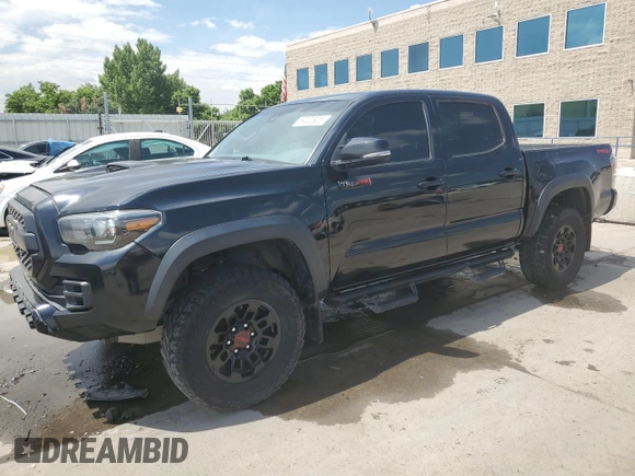 2019 Toyota Tacoma SR with VIN 5TFCZ5ANXKX184626, listed as a Copart auction lot 59220905 with 123,746 mi miles and Salvage title. Bid and sale history available at DreamBid. Image 1.