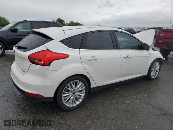 2017 Ford Focus Titanium с VIN 1FADP3N23HL244301, выставлен на аукционе Copart как лот 56625555 с пробегом 96 304 миль миль и Списание • Salvage title. История ставок и продаж доступна на DreamBid. Изображение 3.