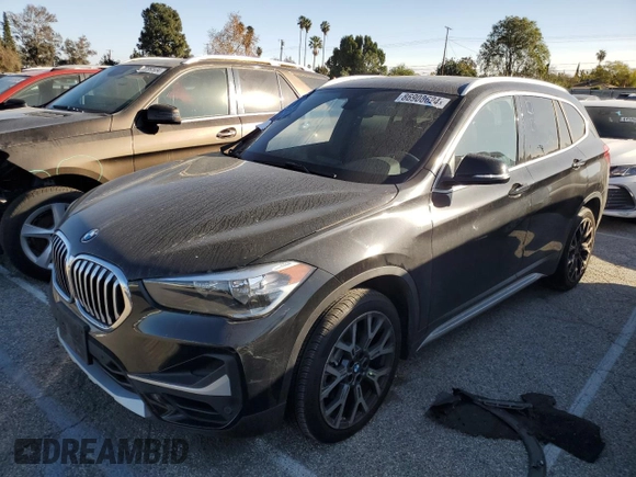 2022 BMW X1 sDrive28i with VIN WBXJG7C07N5U58359, listed as a Copart auction lot 86908624 with 34,557 mi miles and Salvage Title. Bid and sale history available at carsss.com. Image 1.