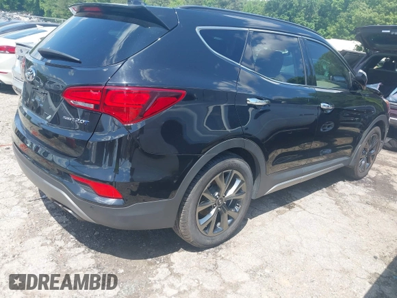 2017 Hyundai Santa Fe Ultimate with VIN 5NMZW4LA1HH052430, listed as a IAAI auction lot 42205489 with 85,720 mi miles and . Bid and sale history available at DreamBid. Image 4.