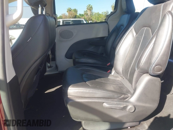 2021 Chrysler Pacifica Hybrid Touring L with VIN 2C4RC1L76MR581285, listed as a IAAI auction lot 42303222 with 77,808 mi miles and . Bid and sale history available at DreamBid. Image 8.