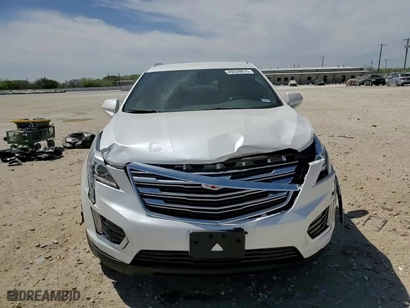 2019 Cadillac XT5 FWD with VIN 1GYKNARS0KZ121284, listed as a Copart auction lot 49339815 with 56,759 mi miles and Salvage Title. Bid and sale history available at carsss.com. Image 11.