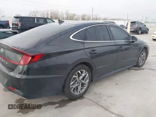 2023 Hyundai Sonata SEL with VIN KMHL64JA9PA329659, listed as a IAAI auction lot 38841225 with 4,772 mi miles and . Bid and sale history available at DreamBid. Image 4.