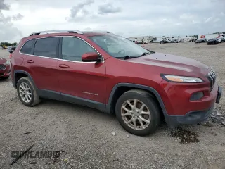 2015 Jeep Cherokee Latitude with VIN 1C4PJLCS7FW671262, listed as a Copart auction lot 54716405 with 172,085 mi miles and Clean Title. Bid and sale history available at carsss.com. Image 4.