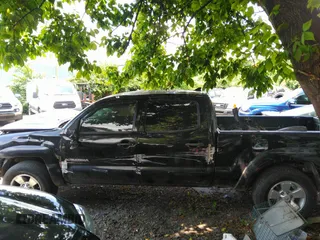 2014 Toyota Tacoma with VIN 3TMMU4FN6EM072471, listed as a IAAI auction lot 42525218 with 150,461 mi miles and . Bid and sale history available at DreamBid. Image 15.