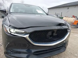 2018 Mazda CX-5 Grand Touring with VIN JM3KFBDM3J0384431, listed as a IAAI auction lot 42013474 with 65,018 mi miles. Bid and sale history available at carsss.com. Image 6.