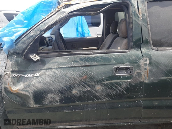 2003 Toyota Tacoma PreRunner z VIN 5TEGN92N53Z231042, wystawiony jako Copart lot #55854505 z przebiegiem Nie podano mil oraz Szkoda całkowita • Salvage title. Historia ofert i sprzedaży dostępna na DreamBid. Obrazek 7.