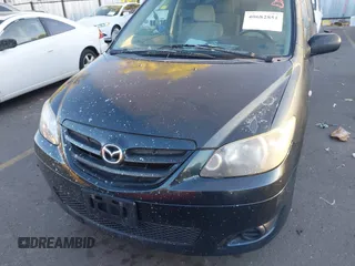 2005 Mazda MPV LX with VIN JM3LW28A650547549, listed as a IAAI auction lot 40682851 with 212,438 mi miles. Bid and sale history available at carsss.com. Image 12.