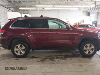 2016 Jeep Grand Cherokee Laredo z VIN 1C4RJFAG3GC471619, wystawiony jako IAAI lot #41659523 z przebiegiem 139 671 mil mil oraz . Historia ofert i sprzedaży dostępna na DreamBid. Obrazek 13.