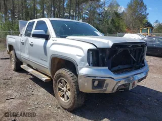 2015 GMC Sierra 1500 SLE with VIN 1GTV2UECXFZ153161, listed as a IAAI auction lot 41833071 with 148,234 mi miles. Bid and sale history available at carsss.com. Image 1.