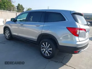 2021 Honda Pilot EX with VIN 5FNYF5H37MB014384, listed as a IAAI auction lot 42412500 with 36,934 mi miles and . Bid and sale history available at DreamBid. Image 3.
