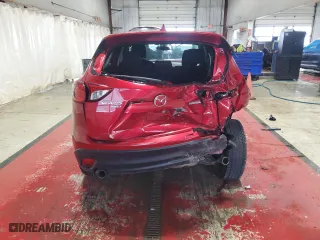 2016 Mazda CX-5 Touring with VIN JM3KE4CY0G0803265, listed as a Copart auction lot 51362065 with 84,955 mi miles and Salvage Title. Bid and sale history available at carsss.com. Image 6.